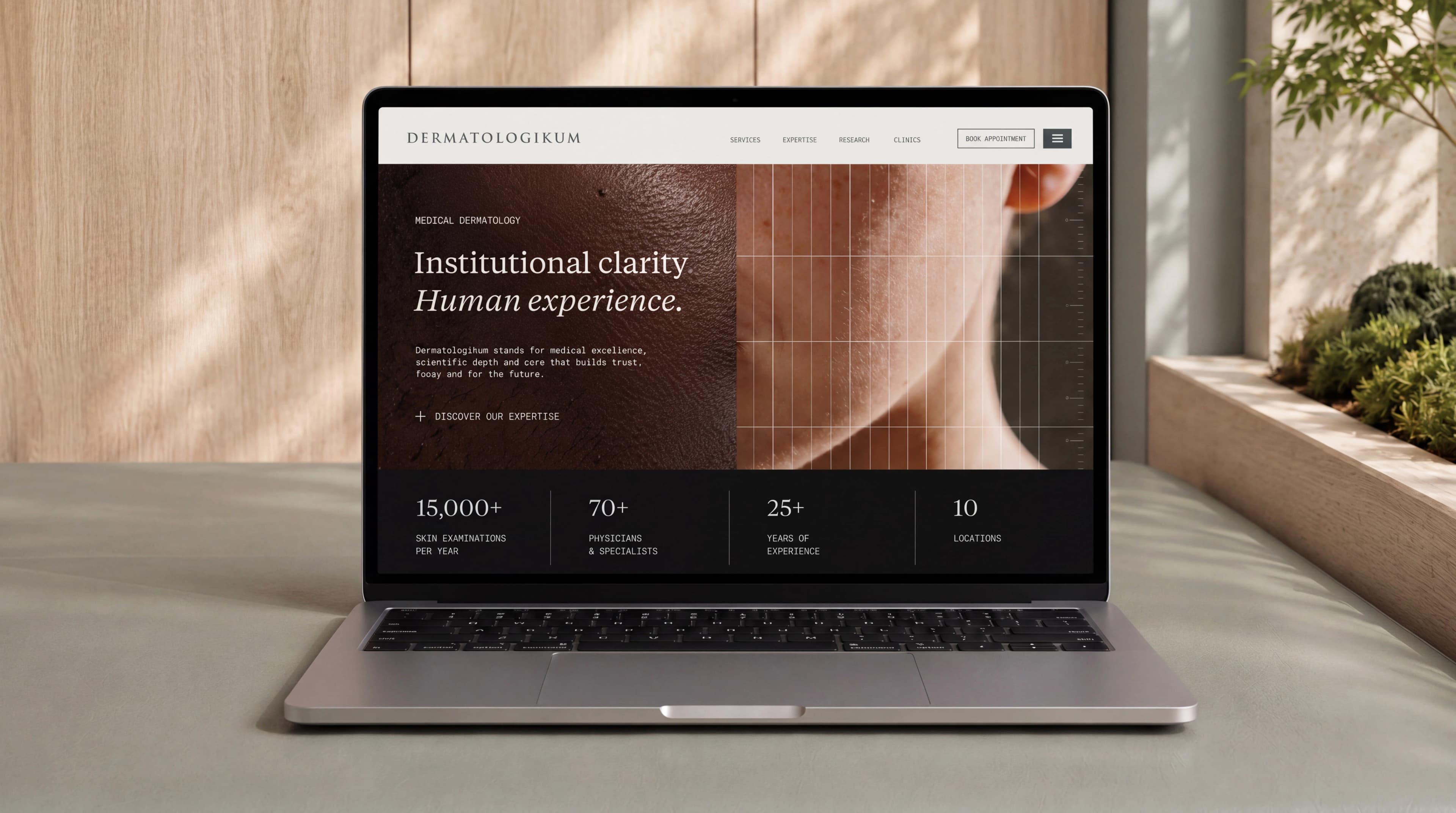 Dermatologikum medical dermatology website displayed on a laptop within the clinic interior — Digital Design by Parallel Creative Agency — Derma, health and beauty