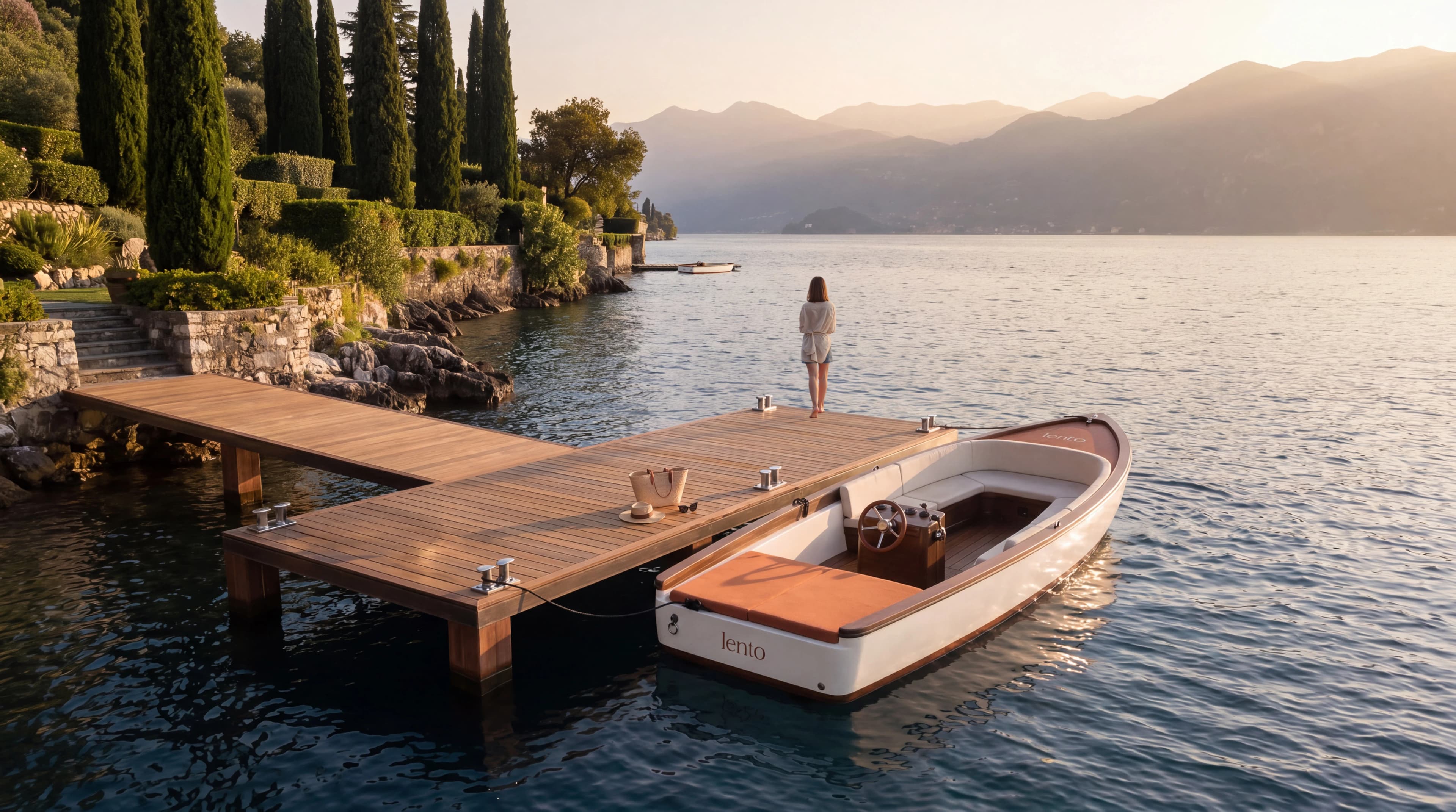 Aerial view of a branded boat beside a timber jetty — Experience Design by Parallel Creative Agency — Lento, hospitality