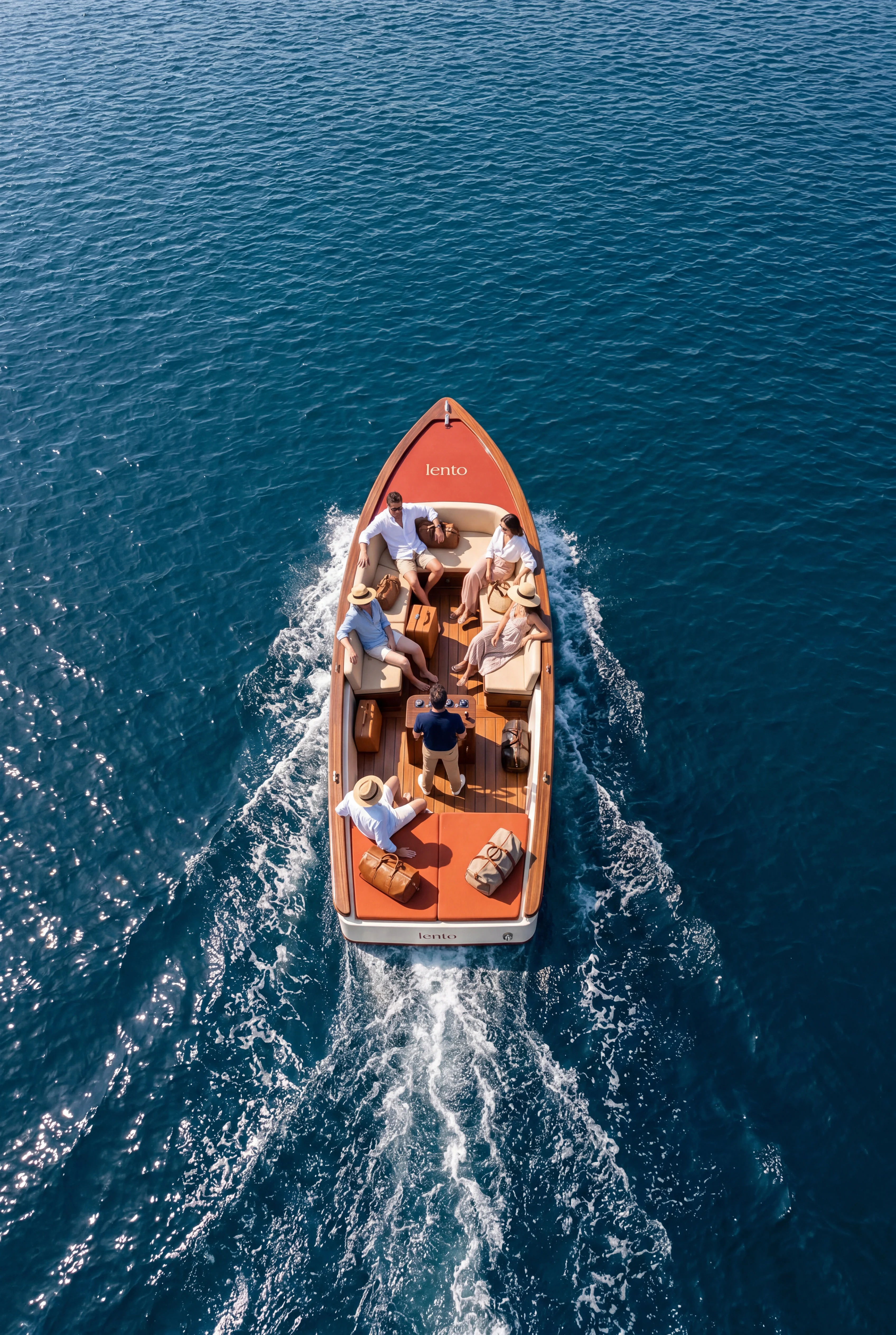 Overhead view of guests cruising across the lake in a Lento branded boat — Experience Design by Parallel Creative Agency — Lento, hospitality